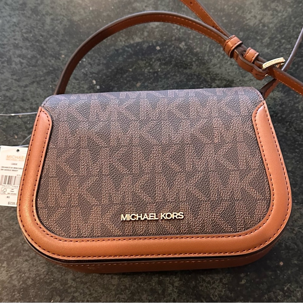 Brand new with tags. Michael Kors Lucie bag